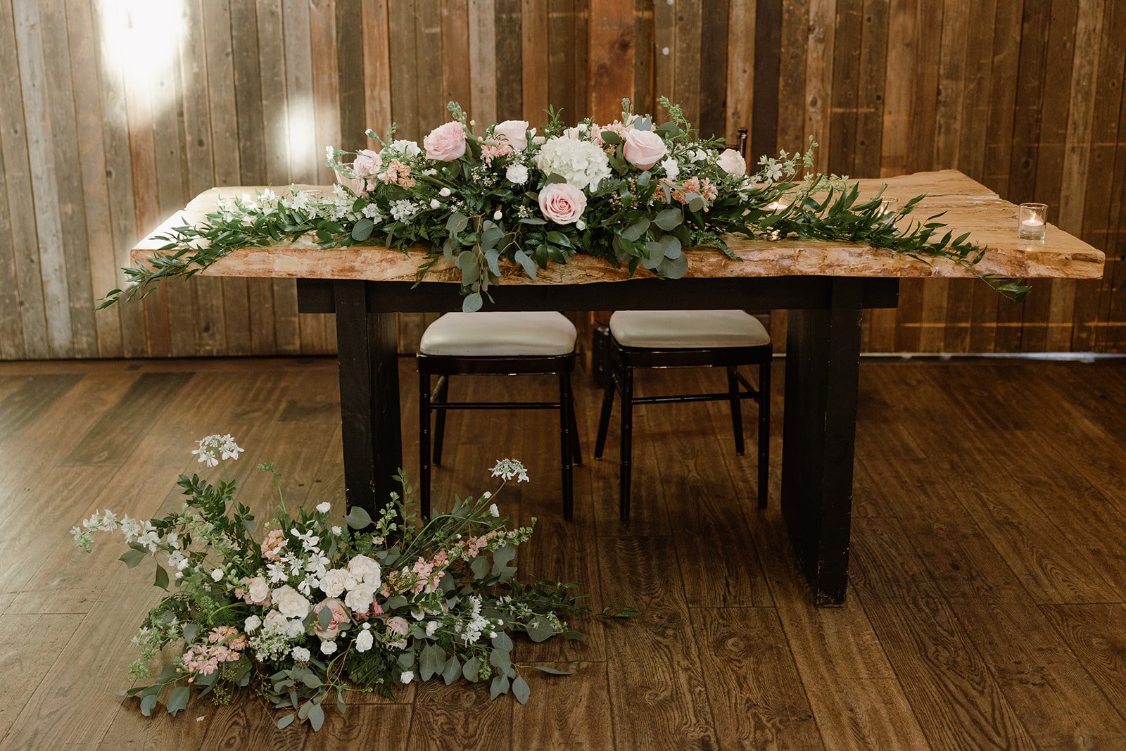 sweetheart table with green and pink florals